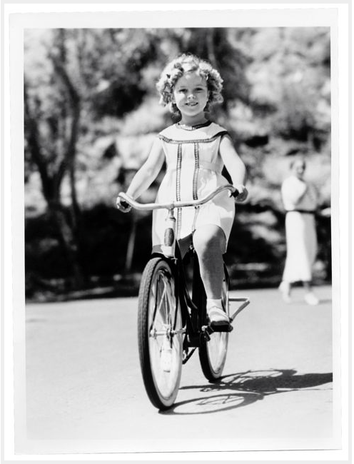 Shirley Temple on a bike, via ridesabike.com