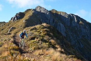 Jonathan riding the Old Ghost Road on the West Coast (pic: Kennett Brothers, via www.nzcycletrail.com