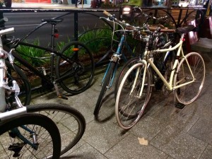 Overflowing bike racks on a typical night on K Rd.