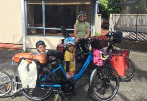 Family ready for e-bike camping holiday
