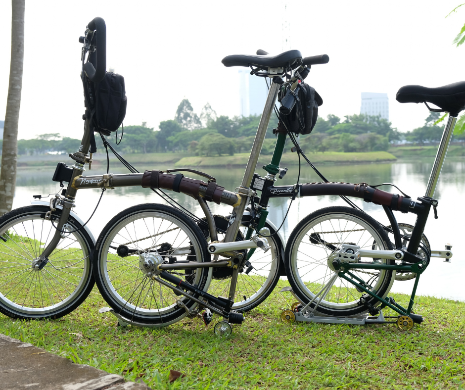 Two folding bikes are parked